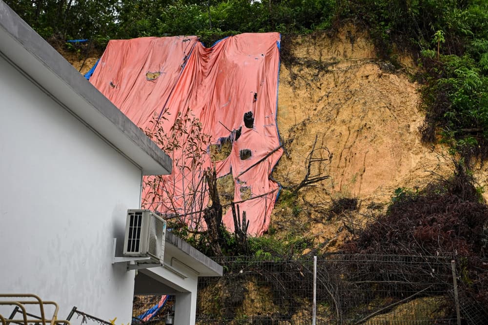Early-morning landslide buries part of Seremban house, family of six affected