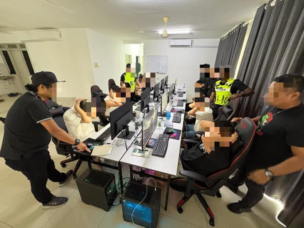 Cops bust eight online scam rings in KL, arrest 52 foreign nationals and five locals