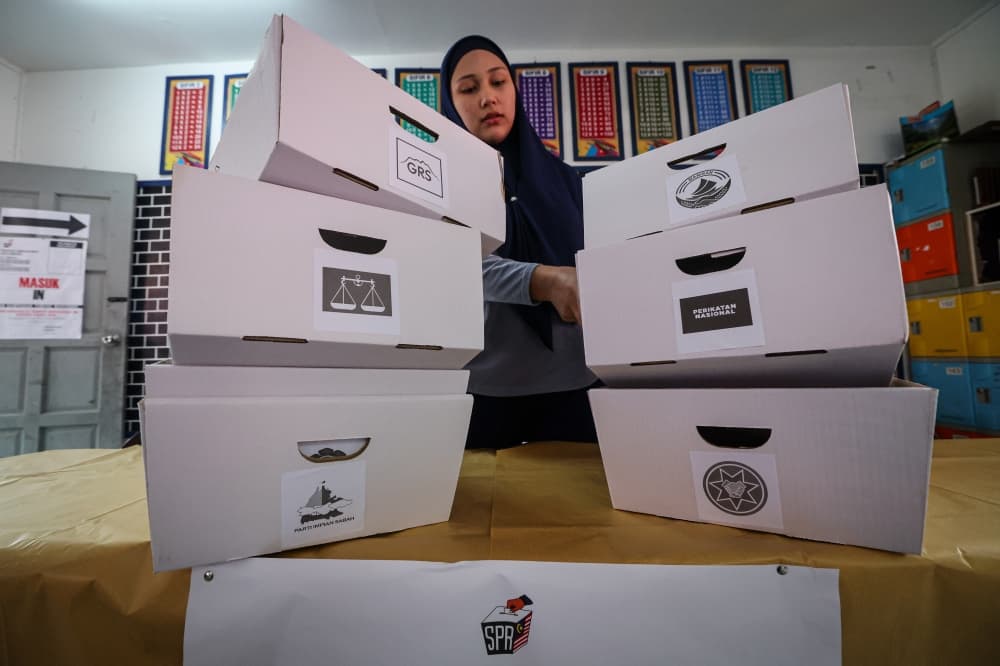 EC begins opening postal ballots for 17th Sabah state election