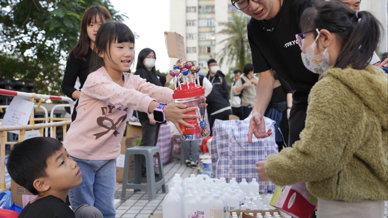 Laughter heard at shelters as children, students learn to cope with Hong Kong fire