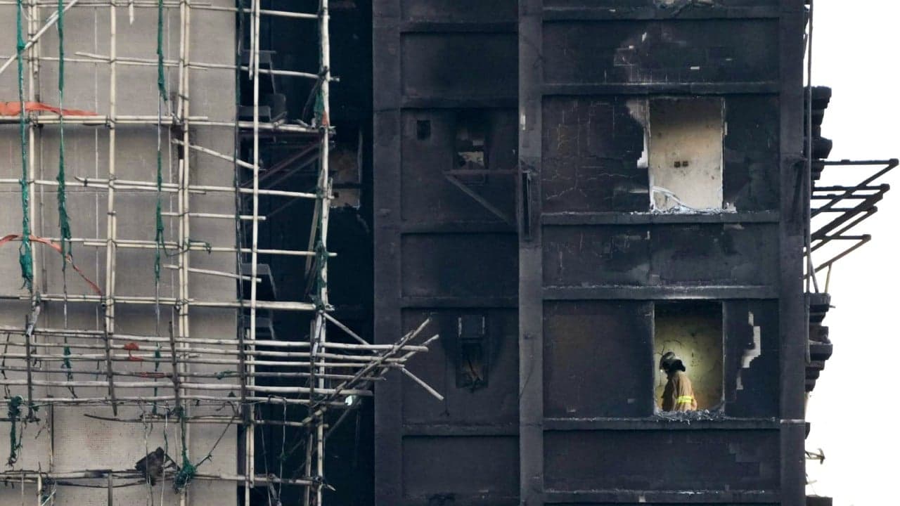 Anxious wait for relatives of people still missing in deadly Hong Kong fire