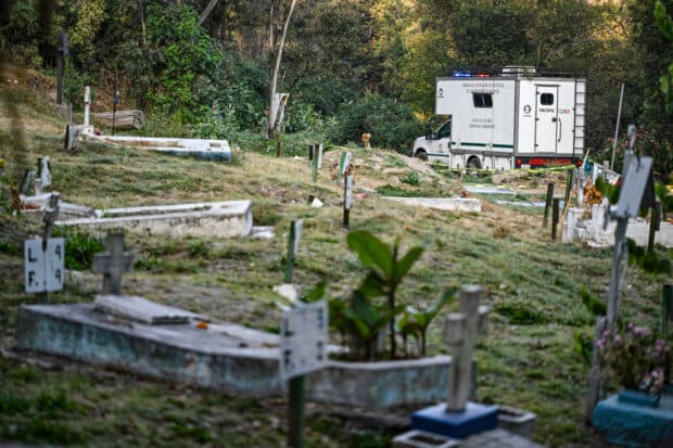 Inch by inch: Search for Mexico's disappeared in city cemetery